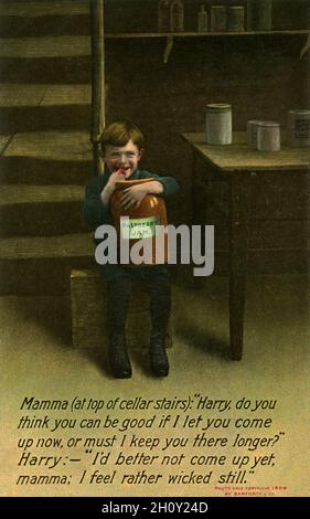 Smiling boy scoffing raspberry jam:  vintage Edwardian Bamforth Comic Series postcard, dated 1909, number 1444 Stock Photo