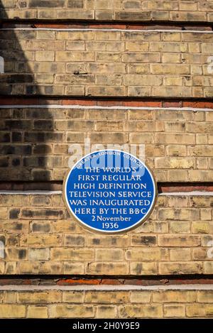 Blue plaque commemorating the world's first high definition television service inaugurated by the BBC in 1936, Alexandra Palace, an entertainment and Stock Photo