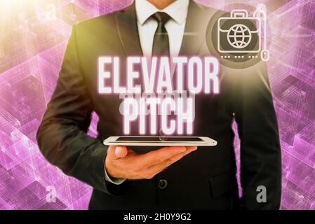 Conceptual caption Elevator Pitch. Internet Concept A persuasive sales pitch Brief speech about the product Man In Office Uniform Holding Tablet Stock Photo