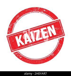 KAIZEN text on red grungy round vintage stamp. Stock Photo