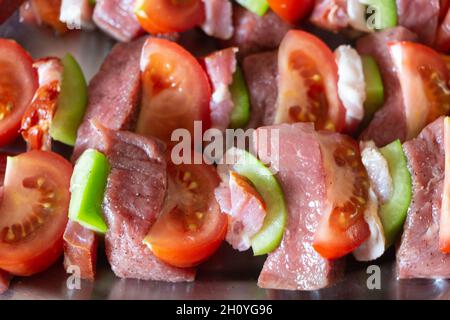 Beef and vegetables brochette on a dish Stock Photo