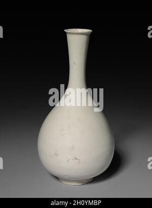 Bottle Vase: Ding ware, 12th Century. China, Jin dynasty (1115-1234). Glazed white porcelain; overall: 28.3 cm (11 1/8 in.). Stock Photo