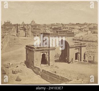 Lucknow After the Siege: Bailee Guard Gate, Taken from the Inside, Showing the Clock Tower, 1858. Felice A. Beato (British, 1830-1906). Albumen print; image: 25.4 x 30.5 cm (10 x 12 in.). Stock Photo