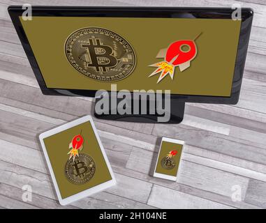 Bitcoin growth concept shown on different information technology devices Stock Photo