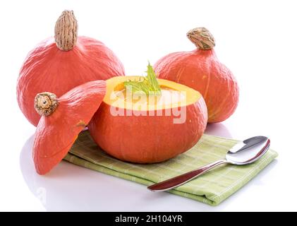 Pumpkin soup in a pumpkin, isolated on white Stock Photo