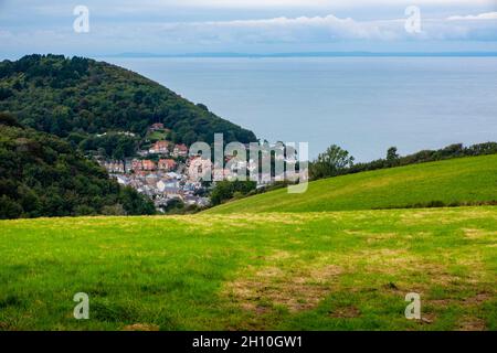 View looking down on Lynton a small seaside resort town on the North Devon coast in south west England UK with Bristol Channel in the background. Stock Photo