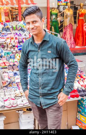 LUCKNOW, INDIA - FEBRUARY 3, 2017: Local shoe vendor in Lucknow, Uttar Pradesh state, India Stock Photo