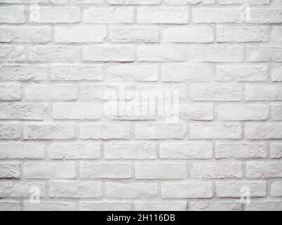 Flat stacked white brick wall. Background and Texture Stock Photo