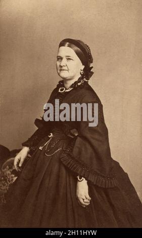 Mary Todd Lincoln (1818-1882), First Lady of the United States as wife of U.S. President Abraham Lincoln, three-quarter length portrait in black mourning dress after the death of her son, Willie, Mathew Brady Studio, 1863 Stock Photo