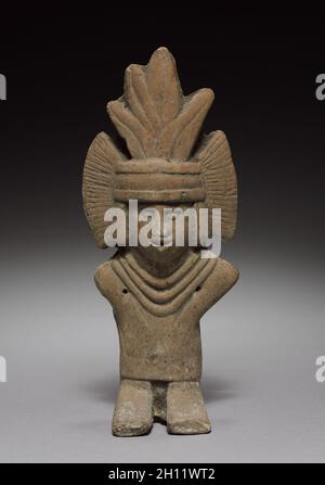 Figurine, 1325-1521. Mexico, Aztec. Pottery; overall: 19.8 cm (7 13/16 in.). Stock Photo