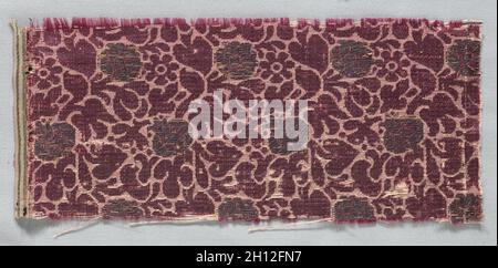 Brocaded Textile Fragment, late 1500s - early 1600s. Italy, late 16th - early 17th century. Brocade; silk and metal; overall: 11.4 x 25.4 cm (4 1/2 x 10 in.). Stock Photo