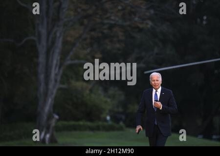 Washington DC, USA. 15th Oct, 2021. President Joe Biden walk on the South Lawn of the White House October 15, 2021 in Washington, DC. Biden traveled to Hartford and Storrs, Connecticut to promote parts of his 'Build Back Better' agenda. Photo by Oliver Contreras/Pool/ABACAPRESS.COM Credit: Abaca Press/Alamy Live News Stock Photo