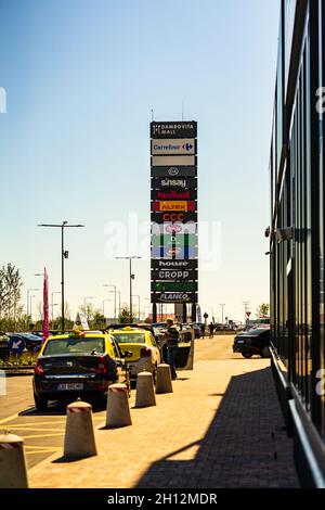 Store sign in the parking lot of Dambovita Mall in Targoviste, Romania, 2021 Stock Photo