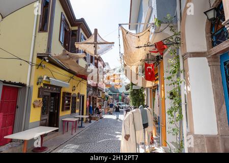 Ayvalik, Turkey - September 2021: Ayvalik old street view with historical buildings and architecture style. Ayvalık is a popular seaside in Turkey Stock Photo