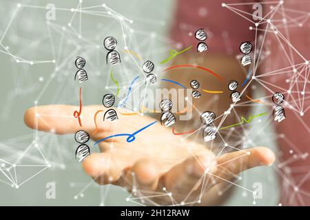 Human icons floating over a man's palm - digital work conference concept Stock Photo