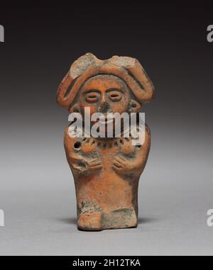 Figurine, 1325-1521. Mexico, Aztec, 14th century-16th century. Terracotta; overall: 7 cm (2 3/4 in.). Stock Photo