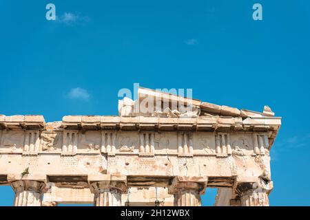 Ancient Greek temple of Parthenon on Acropolis, Athens, Greece. It is top landmark of Athens. Ruins of on blue sky background with copy space for text Stock Photo