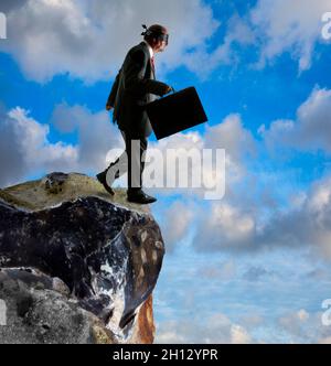 Blindfolded man walking off a cliff, conceptual image - Stock Image -  F034/1696 - Science Photo Library