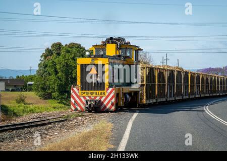 Mackay, Queensland, Australia - October 2021: A train hauling harvested sugarcane to the refinery to be crushed into sugar Stock Photo