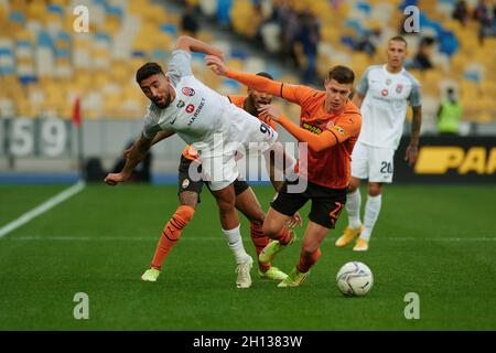 KYIV, UKRAINE - OCTOBER 15, 2021: Allahyar Sayyadmanesh vs defender Mykola Matviyenko (22). The football match of UPL, FC Shakhtar Donetsk vs FC Zorya Stock Photo