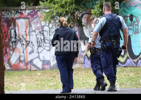 Sydney, Australia. 16th October 2021. As part of the freedom movements, a Sydney United in Prayer event was held at Camperdown Memorial Rest Park, Newtown. People also assembled in Parramatta and Canterbury/Bankstown. Pictured: police patrol Camperdown Memorial Rest Park, Newtown. Credit: Richard Milnes/Alamy Live News Stock Photo