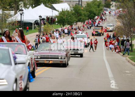 Bloomington, United States. 15th Oct, 2021. Floats drive by spectators during the Indiana University Homecoming Parade. Student Groups participate in the Indiana University (IU) Homecoming Parade. The parade began on 17th Street and Woodlawn. (Photo by Jeremy Hogan/SOPA Images/Sipa USA) Credit: Sipa USA/Alamy Live News Stock Photo