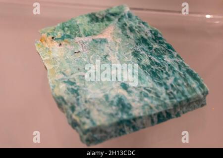 Amazonite green collection stone on display (selective focus). Stock Photo