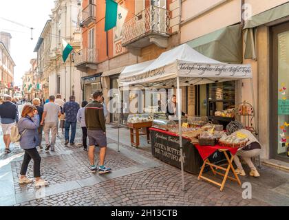 Alba, Cuneo, Piedmont, Italy - October 12, 2021:  truffles sale stall in via Vittorio Emanuele, main street pedestrian (Via Maestra), at time of truff Stock Photo