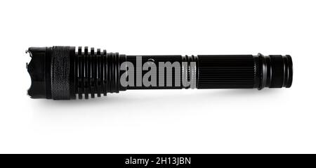 metal black flashlight. Portable flashlight isolate on a white background. Stock Photo