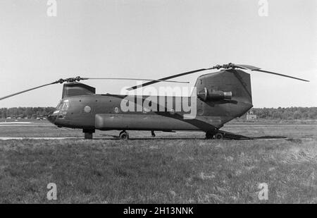 A United States Army Boeing Vertol CH-47C Chinook Helicopter at Brasschaat Airport in Belgium on 19th May 1979. serial number 70-15028. Stock Photo