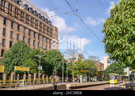 Tram stop platform in St Peter's Square in  Manchester city centre. Stock Photo