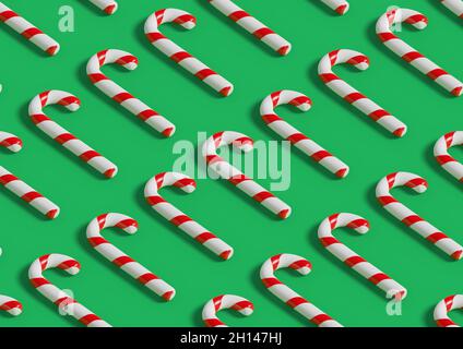 Christmas background. Isometric seamless pattern of candy canes on green background. 3d illustration. Stock Photo