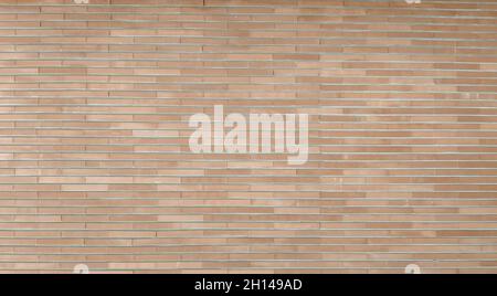 brick wall background. Old brick grunge wall background in brown gray colored Stock Photo