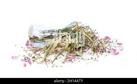 wilted flowers bouquet in a clear glass vase ,Vintage filtered Stock Photo