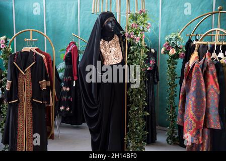 Tehran, Iran. 15th Oct, 2021. Hijab wear is exhibited at the International Trade Fair for Clothing, Fashion, Accessories, Design, and Affiliated Industries (Tehran Modex 2021) (Photo by Sobhan Farajvan/Pacific Press) Credit: Pacific Press Media Production Corp./Alamy Live News Stock Photo