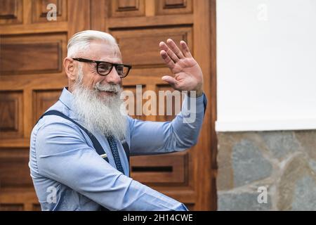 Portrait of fashion senior man going to work - Elderly people lifestyle concept Stock Photo