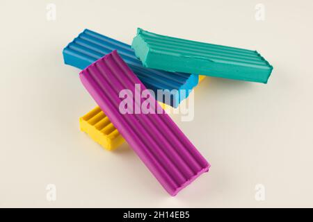 children color wax plasticine for creativity isolated on a white background Stock Photo