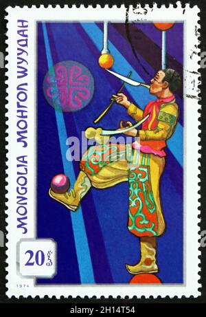 MONGOLIA - CIRCA 1974: a stamp printed in Mongolia shows Juggler, Mongolian Circus, circa 1974 Stock Photo