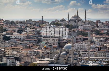 ISTANBUL, TURKEY - OCTOBER 12 ,2021: Istanbul city view on mosque with Sultanahmet district against blue sky and clouds. Sunset in Istanbul, Turkey wi Stock Photo