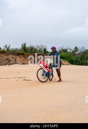 Betul Beach Goa, India September 15th 2021, Local fisherman and locals walking on the Betul beach in Goa in the evening Stock Photo