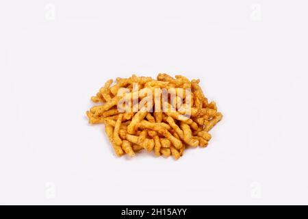 SNACKS STICKS CORN, isolated Image kurkure or namkeen sticks, background image. Stock Photo