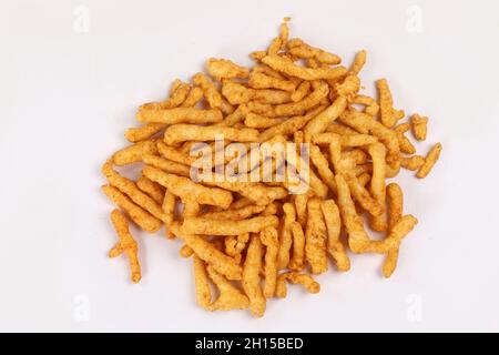 SNACKS STICKS CORN, isolated Image kurkure or namkeen sticks, background image. Stock Photo