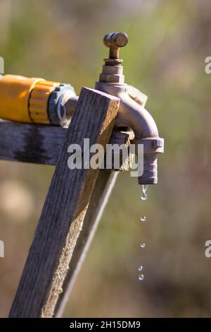 Close-up of outdoor tap with water dripping Stock Photo