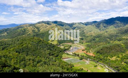 Village and rice fields in Cordillera mountains, Philippines. Beautiful landscape on the island of Luzon. Mountains and fields Stock Photo