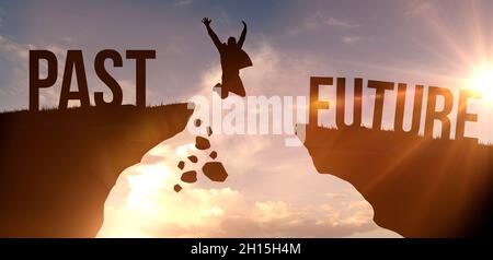 Man jumping over from past to future, success concept. Silhouette of man against sunset sky background Stock Photo