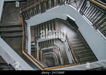 A downward perspective view of an old woodern staircase Stock Photo