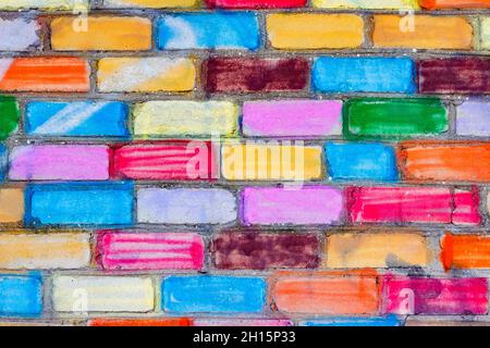 Texture photo of multi-colored and painted white brick wall surface. Stock Photo