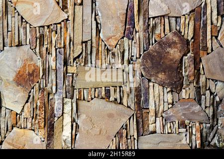 Texture photo of brown colored stone wall tile. Stock Photo