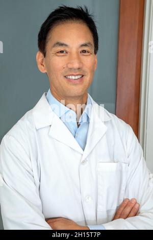 Asian  male doctor inside his office Stock Photo