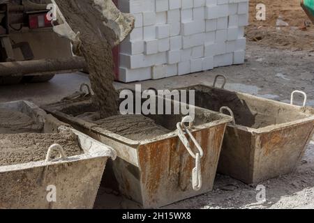 Cement mortar in construction tanks. Cement mortar for brickwork Stock Photo